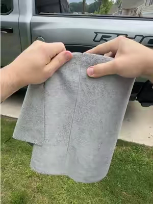 A roll of premium tear-away microfiber cloths that gives you a fresh towel whenever you need one.  #cardetailing #microfiber #carcleaning #detailingtools #blacklinecarcare 