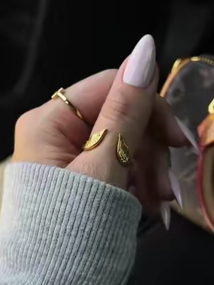 love the hidden engraving 🤍 #angelwing #christianjewelry #ringstack #daintyjewelry #TikTokshopbacktoschool @MantraJewelry 