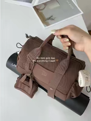 Chocolates brown just hits different.☕️🤎 Small enough to carry everywhere,but roomy enough for my headphones,wallet and post-workout essentials .#gymbag #workbag #pilatesgirl #gymgirl #bagsmart 