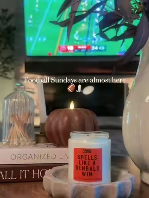 Found the cutest game day candle 🏈🧡 They have one for every NFL team! #FootballSeason #GameDay #NFLFans #CozyHome #BengalsNation