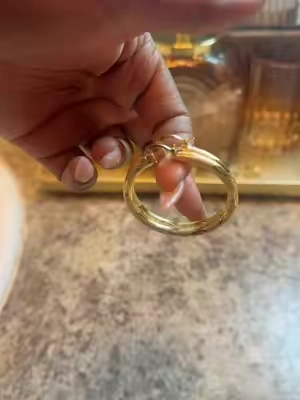 🎬 Stash or Trash – Episode 210: 14K Gold Diamond-Cut Huggie Hoop Earrings ✨💛 Y'all... these are definitely a STASH! 💎✨ Now listen... I don't baby my jewelry. These earrings have survived the shower, the rain, AND the pool, and guess what? Still no tarnishing! 👏🏽😂 They said, "We're not going anywhere!" And can we talk about that diamond-cut texture? Every time the light hits them, they're sparkling like they just got a fresh paycheck! ✨ If you have sensitive ears like me, these are a win because they're lightweight, comfortable, and I can wear them all day without feeling like my ears are filing a complaint. 😂 They're the perfect everyday earrings. Whether you're headed to work, brunch, date night, or just trying to look expensive while buying groceries, these hoops are going to get the job done! Final Verdict: ⭐⭐⭐⭐⭐ STASH! They're durable, beautiful, sparkle like crazy, and have officially earned a permanent spot in my jewelry collection! Hashtags: #StashOrTrash #JewelryTok #GoldHoops #TikTokShopFinds #14kgold 