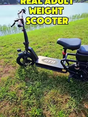 This long-range scooter is perfect for adults. It's capable of carrying adults over 200 pounds and offers a 35-mile range with its 20 amp hour battery. #Scooter #ElectricScooter #AdultScooter #LongRange #Commute
