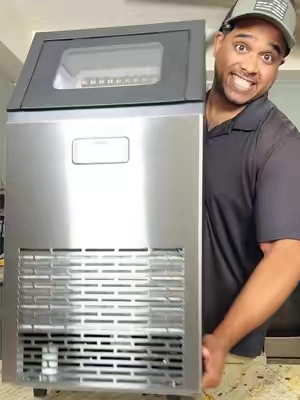 🧊 I stopped buying bagged ice. This commercial ice maker makes up to 100 pounds of fresh ice a day, and it works anywhere you've got an outlet: home bars, garages, workshops, parties, small businesses, food trucks, restaurants, offices, RVs, and events.   High output, almost no upkeep. Built-in self-cleaning system, fast ice cycle, and a compact footprint that fits in tight spaces.   Why this one?? 🧊 Makes up to 100 lbs of ice daily ⚡ Fast ice cycle, ready when you need it 🫧 Commercial self-cleaning function 📦 Built-in ice storage bin, 33 lbs 🚱 No plumbing needed, runs off a water jug 🔩 Commercial-grade stainless build 🍻 Great for bars, parties, garages, shops and events 🛒 Beats buying bagged ice 🔌 Plug and play, no install   Hosting a party, running a business, stocking a bar, or just tired of gas station ice runs, this thing pays for itself fast. Commercial units run fifteen hundred. This isn't close.   Ideal for: 🏠 Home bar and man cave 🔧 Garage and workshop 🚚 Restaurants and food trucks ☕ Offices and break rooms 🎉 Events and parties 🏕️ RV and outdoor setups #icemachine #icemakermachine #icecube #cooler #kismile 