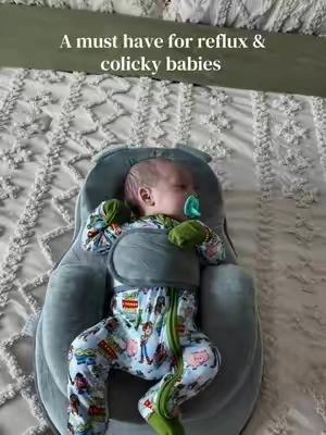 It keeps them elevated after feeds which is a huge help!  #colickybaby #reflux #nursingpillowforfeeding 