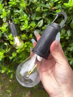 Stop searching tor a tlashlight when the power goes out. This rechargeable LED bulb works as a regular bulb, then becomes a bright handheld backup light when you need it most. Tap to shop. #EmergencyLight #RechargeableBulb #PowerOutage #BackupLight #tiktokshop
