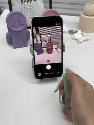 Sit back, relax, and browse TikTok without lifting a finger. This remote creates the ultimate effortless scrolling experience. #phonestandholder #phoneaccesories #bedrotting #tiktokmademebuyit #dealsforyoudays