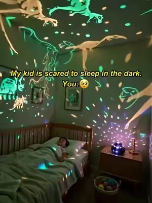 My kid is scared to sleep in the dark.#Onefirenightlightforkids #SoothingLight #BedtimeRoutine #nightlightprojector #dinosaur