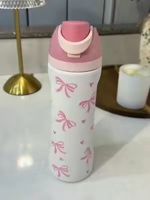 Insulated tumbler with a bows and hearts print, aesthetic style #insulatedtumbler #tumbler #AestheticTumbler #Bows #cutecups 