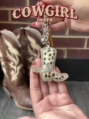 The cutest little cowgirl accessory is here! 🤠🎀 Add a western touch to your bag, keys, or backpack with this adorable cowgirl charm.                             #CowgirlCharm #BagCharm #WesternStyle #Accessories #TikTokShop
