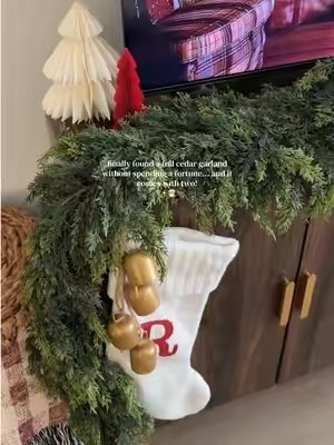 the best affordable cedar garlands i’ve found this year #garland #cedargarland #christmasgarland #christmasdecor #homefinds 