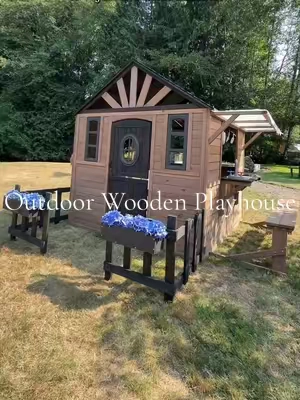 This is SO much more than a basic playhouse 🥹🏡 The little “front yard” with the flower pots, the adorable awning, outdoor kitchen AND bench make it feel like their own tiny home. 🤍 I love that it’s all wood too—it looks so nice in the backyard instead of like another giant plastic toy 😂 And it’s actually roomy enough for multiple kids to play together, with plenty of space for bigger kids to enjoy it too! 🌸🍳☀️ @ALBOTT  #KidsPlayhouse #OutdoorPlay #BackyardPlay #KidsOutdoorToys #Playhouse 