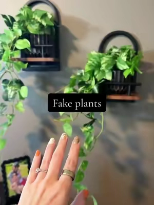 you want a plant wall but can’t keep plants alive 🤭 #artificialplants #plantwall #fakeplants #homedecor #earthy 