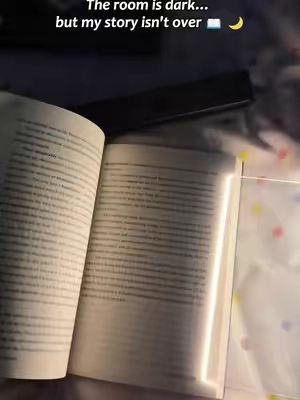 The room stays dark.🌛 My book stays bright.📖💡 And for a few minutes, everything feels peaceful.💕#booklight #booklover #BookTok #bookworm #tiktokmademebuyit 