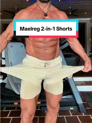 Maelreg 2-in-1 shorts are designed with a supportive built-in liner that stays in place, helping reduce chafing and keeping you comfortable through every rep, run, and workout. Add in zipper pockets, a secure drawstring waistband, and lightweight stretch fabric, and you’ve got a pair of shorts you’ll reach for every day. #mensshorts #workoutshorts #mensstyle #gymwear #activewear 
