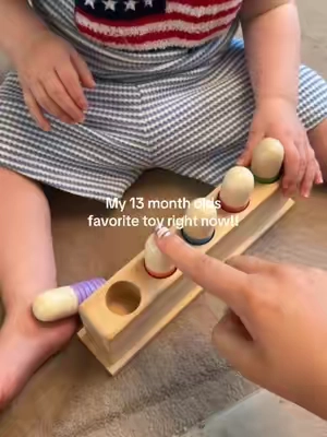Such an amazing toy to help with fine motor skills and building that hand eye coordination! He thinks his toy is so funny! #toddlertoyfinds #finemotorskills #earlydevelopment #earlylearning #toyrecommendations 