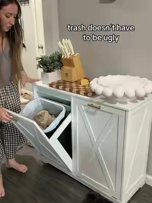 Tilt out double trash or laundry bin! Looks so much nicer than standalone bins! #trash #trashbin #laundry #kitchen #homedecor 