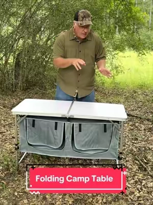 Portable camping kitchen table with adjustable height, folding design, side tables, countertop workspace, and zippered storage compartments. Reinforced X-frame construction provides stability while the slim-fold design makes transport and storage easy. Ideal for camping, RV trips, picnics, tailgating, backyard cooking, grilling, and outdoor food prep. #Camping #Outdoors #tentcamping #foldingtable #thrivingcountry 
