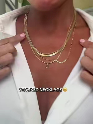 Stacked gold necklace. Obsessed with it and love that it's all attached. #goldjewelry #daintyjewelry #stackedjewelry #stackednecklace #necklace 