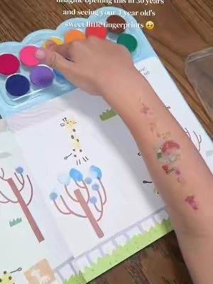 She loved painting this whole book and it is so sweet because now it is filled with her little finger prints for me to keep forever! @jarmeloofficial  #fingerpainting #kidsart #messfree #memories #backtoschool 