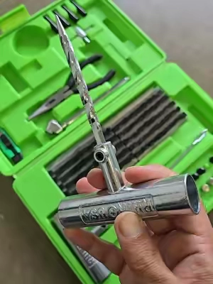 Rhino USA 86-Piece Tire Plug Repair Kit with 60 gummy plugs, repair tools, pressure gauge, and valve accessories for roadside flat tire emergencies. Keep this tubeless tire repair kit in your car, truck, ATV, UTV, RV, or trailer for quick puncture repairs when you need them most. #flatfix  #tireplugkit #tirepuncturerepair #tubelesstirerepair #flattirerepair