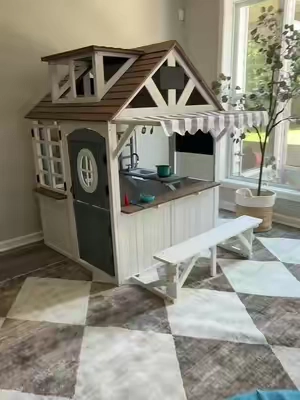 This is hands down their favorite addition to their play room! #playhouse #toddlertoys #pretendplay #openendedtoys #playkitchen 