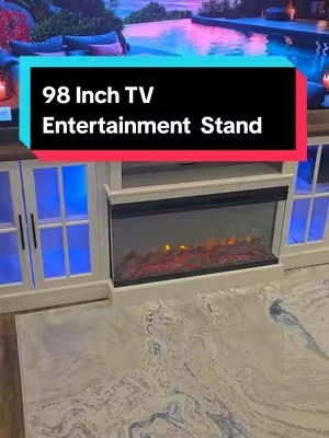 Upgrade your entertainment space with this 98-inch fireplace TV stand. Designed to support extra-large TVs, it combines spacious storage with the cozy ambiance of a built-in electric fireplace, making it a stylish centerpiece for movies, gaming, and everyday living. #FireplaceTVStand #EntertainmentCenter #ElectricFireplace #HomeFurniture #LivingRoomDecor 