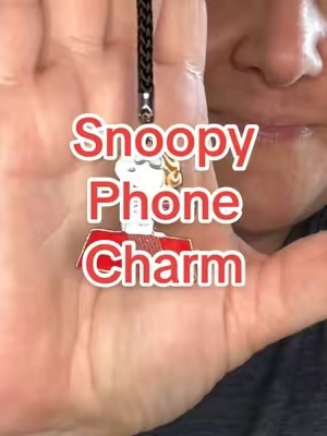 Snoopy fans, it’s a surprise! 🐾 The Peanuts Many Faces of Snoopy blind box phone charm features one of five adorable Snoopy designs, including Joe Cool, Flying Ace, Beagle Scout and more. Such a fun little collectible, stocking stuffer or gift for a Peanuts lover! #Snoopy #Peanuts #SnoopyCollectibles #BlindBox #StockingStuffers 
