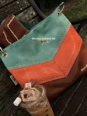 Fall is calling 🍂🤎 This slouchy Montana West bag with color-block details and statement studs is the perfect western inspired everyday bag! 🤠✨ #MontanaWest #MontanaWestBag #WesternBag #FallBag #FallFashion     