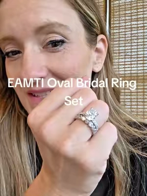 Two-piece bridal ring set featuring an oval cubic zirconia center stone and a full eternity band that can be worn together or separately. #OvalRing #BridalRingSet #CubicZirconiaRing #WeddingRingSet #EAMTI @EAMTI Jewelry 
