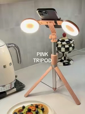 this tripod literally has everything 😭 extends up to 67”, built-in removable fill lights, 360° rotation, adjustable phone holder + angles, bluetooth remote for hands-free filming & it folds down super small for travel/storage 🤌🏼🎀 literally made for content creators💖✨ #contentcreatormusthave #phonetripod #contentcreatortips #tiktokshopfinds #creatorfinds