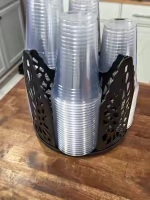 Clean up that coffee station clutter! ☕🙌 This rotating 4-tier cup holder keeps disposable cups and lids organized, easy to see, and within reach without taking over your countertop. The detachable design makes it great for coffee bars, kitchens, offices, drink stations, or even bathroom cups. Just spin, grab, and go! #cupstorage #kitchenorganization #coffeebar #creatorsearchinsights #tiktokshopcreatorpicks 
