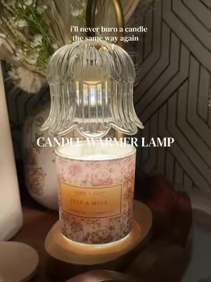why did nobody tell me about candle warmer lamps?! 🕯️  i can smell the candle much more now and it lasts me longer too🤎 #candlewarmerlamp #candlesoftiktok #candlelamp #homedecor #kitchencounterdecor 