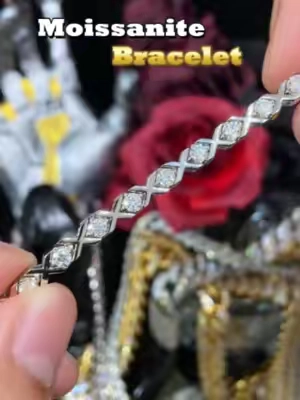 Newly Released Moissanite XOXO Bracelet.#delzzad #moissanitejewelry #unisexjewelry #2026trend #sparkleandshine #giftguide #TikTokshopbacktoschool #moissanite #bracelet #crossbracelet #nontarnish #viraltiktok #14kgold