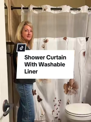 I love that you don’t have to buy rings or a liner! #BathroomDecor #ShowerCurtain