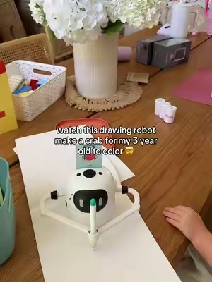 No longer have to be good at drawing to satisfy your toddler anymore 😂 #drawingrobot #toddlermom #toddleractivities #toddlertoys #toddlergiftideas 