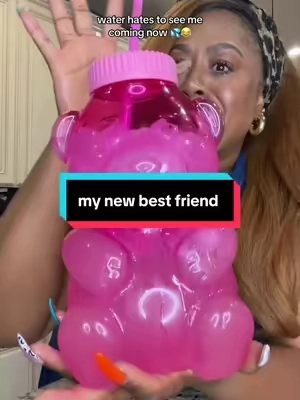 she’s ridiculous, she’s huge, and somehow she’s doing her job. 💦 #hydration #drinkmorewater #giantgummybear #drinkingwater #tumbler 