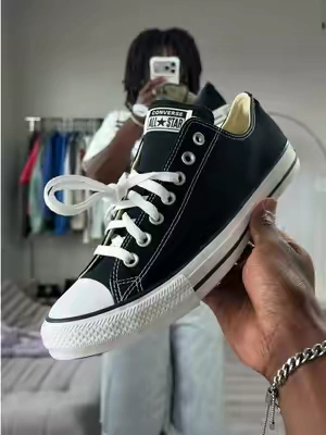The most versatile sneaker ever. #converse #converseallstar #lowtopsneakers #streetwearfashion #fashionfinds  The Converse Chuck Taylor All Star Low Tops, sold by Tilly’s, are one of those sneakers that make almost any outfit work. The classic low-top silhouette, canvas upper, rubber toe cap, vulcanized outsole, and iconic All Star details keep them timeless and easy to style.  Pair them with baggy jeans, jorts, cargos, sweats, or even more dress-casual pieces when you want a clean vintage, Y2K, or everyday streetwear look. They’re especially good if you want a sneaker that doesn’t compete with the rest of your outfit. A true wardrobe staple that goes with just about everything—grab your pair while they’re still available. (Converse, Converse Chuck Taylor All Star, Chuck Taylor All Star Low Top, Converse Low Tops, Converse Sneakers, Classic Sneakers, Canvas Sneakers, Men’s Sneakers, Unisex Sneakers, Casual Sneakers, Vintage Sneakers, Y2K Fashion, Y2K Streetwear, Streetwear Shoes, Men’s Streetwear, Everyday Sneakers, Casual Fashion, Dress Casual, Summer Fashion, Fall Fashion, Outfit Inspiration, OOTD, Streetwear Outfit, TikTok Shop, Tillys, Fashion Finds, Everyday Essentials)