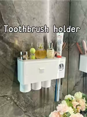 This wall-mounted toothbrush holder saves lots of counter space#tiktokshop #bathroom #toothbrush #holder #wallmounted 