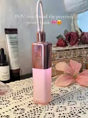 This cute little power bank fits right in my purse and keeps my phone charged wherever I go.💖 #powerbank #batterypack #travelessentials #phonecharger #musthaves.
