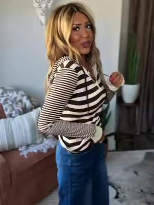 In LOVE with this striped hooded knit top 😍🤎 The perfect mix of cozy, casual, and cute for fall! 🍂 #StripedTop #HoodedKnit #KnitTop #FallFashion #FallStyle 