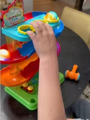 The simplest toys are sometimes the BIGGEST hits! 🏎️✨ This ball racing car is a fun, light-up, cause-and-effect toy that keeps my kids entertained and engaged. The colors, the racing balls, and the lights make it such a fun sensory play win! 🙌 #CauseAndEffectToy #SensoryPlay #KidsToys #ToyFinds #playtime 