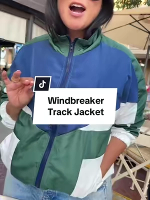 Lightweight, oversized, unisex + the perfect amount of 90s nostalgia. Basically the easiest throw-on-and-go jacket. 🏁 #trackjacket #windbreakerstyle #vintagevibes #unisexfashion #90sfashion 