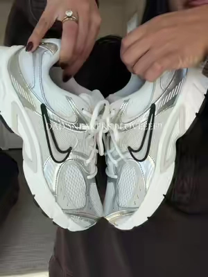 The dad sneakers I love to style through any season! Some of my favorite outfits include these! The neutrals and silver look good with literally anything!  Nike V5 RNR. Nike Dad Sneakers. White Sneaker Outfits. #dadsneakers #sneakers #whiteshoes #nikes #nikeshoes 
