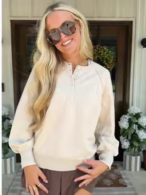 You can take this cutie Henley top through every season with you! The perfect summer to fall top and the best quality! She looks so high end! #tiktokshopcreatorpicks #TikTokshopbacktoschool #henleyshirt #summertofalloutfits #falltop 