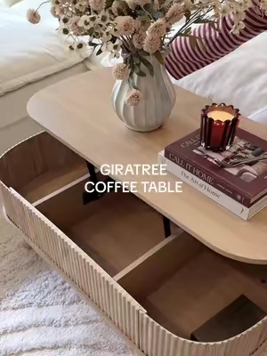 the perfect mix of style and function 🤍 i love that i can lift the top and hide everything away #coffeetable #livingroomdecor #hiddenstorage #homefinds #livingroom 