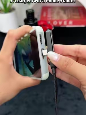 Tired of holding your phone while charging? This 240W 2-in-1 cable is perfect! Fast charge + adjustable stand. Fits all phones. Super convenient! #ConvenientTech #PhoneStandCable #240WFastCharge #iPhoneAndroid #DailyEssentials 