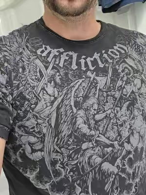 This Affliction tee has that bold old-school graphic look that stands out instantly. The washed red finish, oversized artwork, and rugged style make it an easy pick for anyone who likes statement shirts with some edge. #MensGraphicTee #VintageStyleShirt #MensStreetwear #TikTokShopCreatorPicks #TikTokshopbacktoschool 