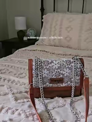 The prettiest little Wrangler purse 🤎 #WranglerBags #WesternStyle #WesternFashion #CowgirlStyle #TikTokShopFinds 