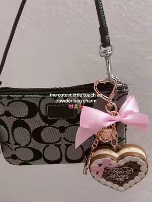 this mini setting powder bag charm from flower knows is so cute and perfect for touch ups🎀 #bagcharms #flowerknows #settingpowder #minimakeup #pursecharms