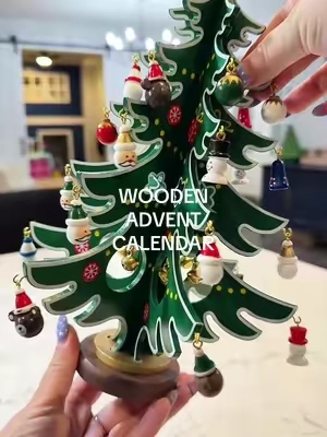 Oh my! 🎄 What a sweet wooden advent calendar; my kids are going to love adding an ornament every day as we countdown to Christmas Day ❤️